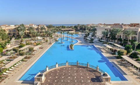 Stretch out along the grand pool promenade with loungers.