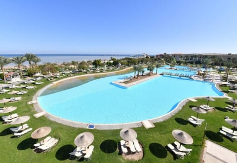 Dive into a lagoon-style pool steps from the beach.