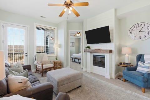 Curl up in the serene living room & stream your favorites on the smart TV​