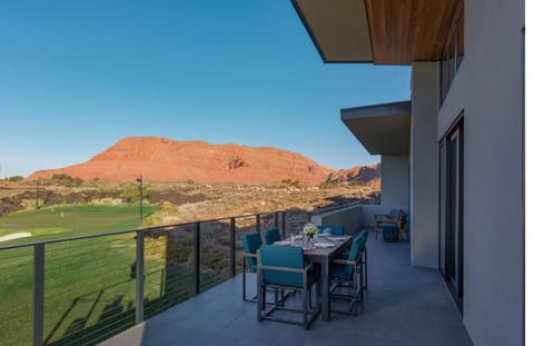 Sip morning coffee on the terrace with sweeping red-rock views.