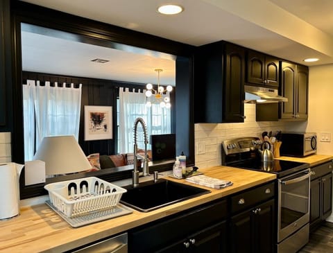 Kitchen looks into the media room