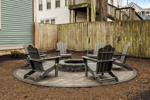 Backyard: After a day of adventures, gather your crew in this private backyard oasis. Soak your cares away in the large, modern hot tub while others relax and chat on the stylish patio seating just steps away. 