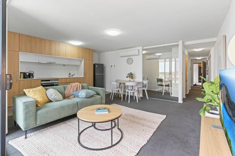 A wonderful open pln living design where the whole family can be together or corporate travelaers can get stuck into conference calls and team meetigns together using the office space and open plan nature of the apartment 