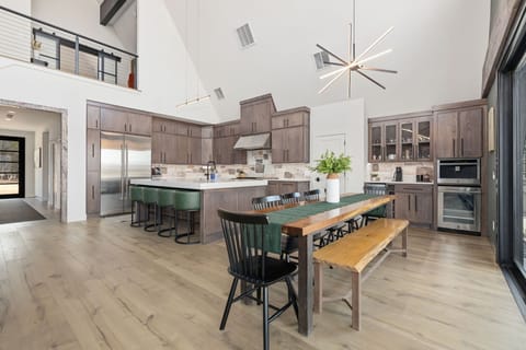 The kitchen is fully stocked with everything you'll need and new appliances.