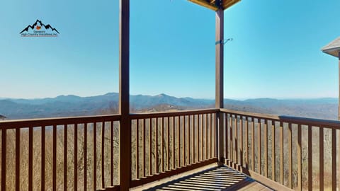 Soak in breathtaking mountain vistas from your private covered deck, where morning coffee tastes better with panoramic views stretching to the horizon.
