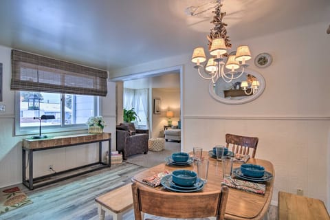 Dining Area | Dining Table | Chandelier Lighting & Window Light