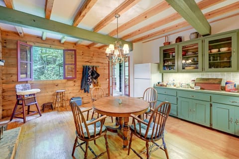 Kitchen | Rustic Cabinets, Stone Hearth & Exposed Beams
