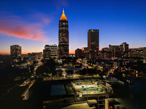 Breathtaking night skyline — Midtown Atlanta’s lights right outside your door.