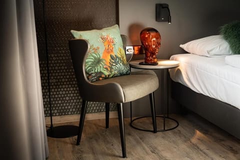 Sip a nightcap beside soft lighting and thoughtful design touches.