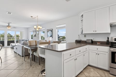 Open-concept layout made for together time—cook at the island while everyone relaxes in the living and dining areas.