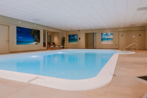 Unwind with a soothing swim in the serene indoor pool.