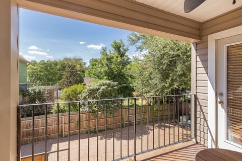 Sip your morning brew on this balcony where the grass is always greener!