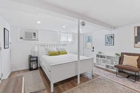Bedroom with luxury custom hotel linens and calming design