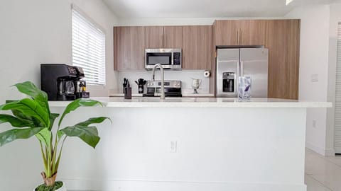 Fully equipped kitchen with modern appliances—prepare healthy meals with ease