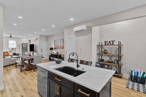The open concept space lets you stay connected with others while prepping meals or just spreading out.