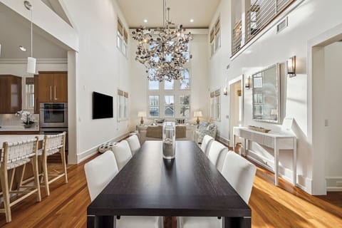 Your elegant dining space flows seamlessly into the living area, creating perfect gathering spots for memorable meals and conversations.