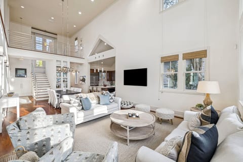 Relax in your bright, airy living space with soaring ceilings, plush seating, and stylish decor that creates the perfect home away from home.