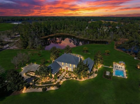 Private 10-acre French estate with twin lakes at sunset