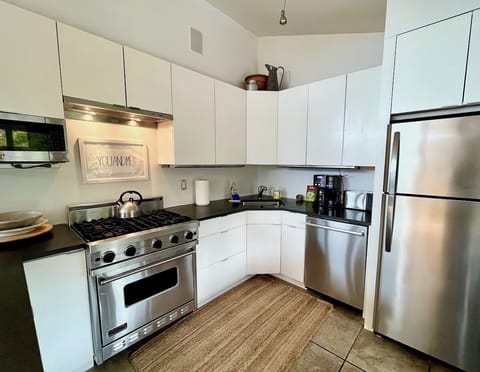 Kitchen has access to porch