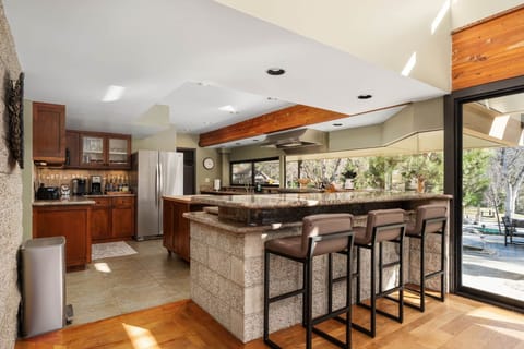 Additional bar seating for three near the kitchen