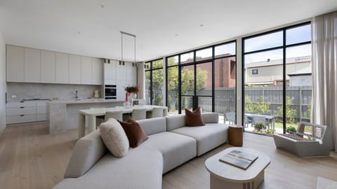 Light and bright living space leading out to secure yard 