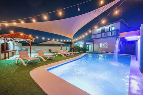 Stay cool under the modern shade canopy while enjoying the private pool oasis.