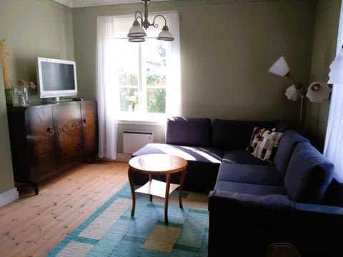 Charming red and white holiday home with lake view near Vimmerby House in Kalmar County, Sweden