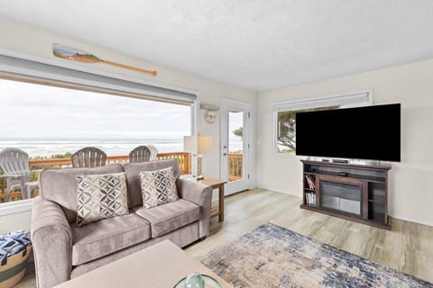 Wake up to stunning ocean views from your cozy living room, where morning coffee tastes even better with waves as your backdrop.