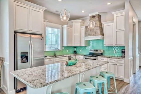 1st Floor - Spacious gourmet kitchen fully stocked with all the cookware and essentials the family chef needs. Enjoy modern appliances, generous prep space, and an open layout perfect for preparing meals, hosting gatherings, and entertaining with ease.
