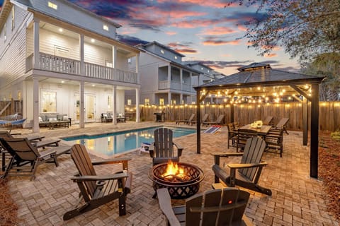 Tipsy Turtle | Sleeps 28 in Miramar Beach! Just 1 minute to the beach with a FREE 6-seat golf cart. Private HEATED pool, outdoor kitchen, fire pit, and game room make this the ultimate Destin group getaway near Sandestin & 30A. Book your beach escape today