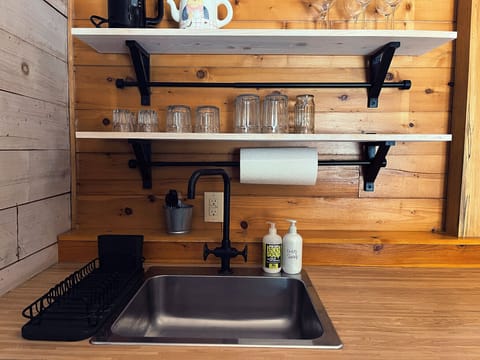 Open shelving over the kitchen sink