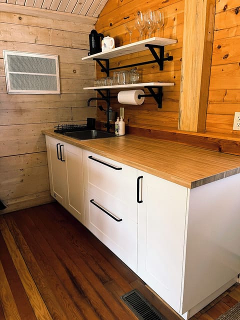 Cottage Kitchen with butcher block countertops
