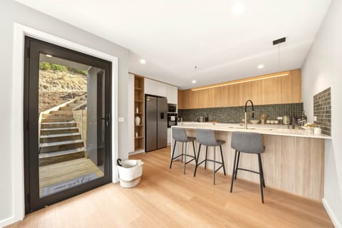 Fully equipped kitchen with modern appliances.