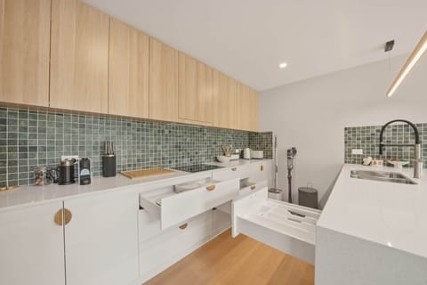 Oven, cooktop, microwave and fridge included.