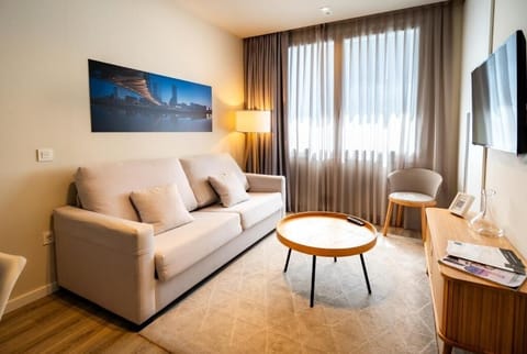 Kick back on the plush sofa for a cozy movie night.