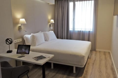 Catch up on emails at the in-room desk, then relax.