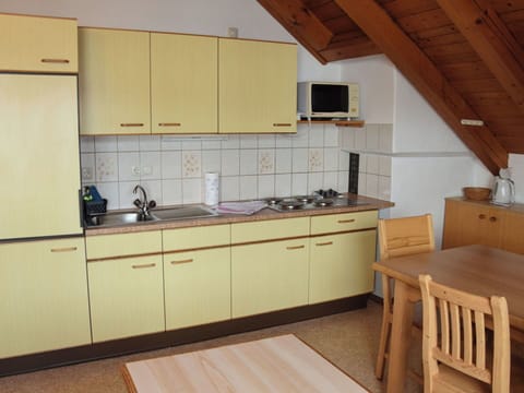 Wood, Flooring, Kitchen, Interior Design, Furniture, Floor, Countertop, Sink, Cabinetry, Room