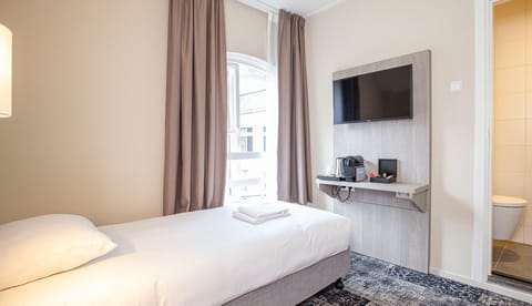 Wake up to soft daylight and coffee right in-room.