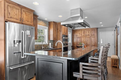 Open living room, kitchen, and dining with plenty of seating for everyone!