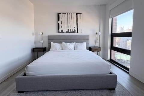Drift off in a serene room with soft, modern styling.