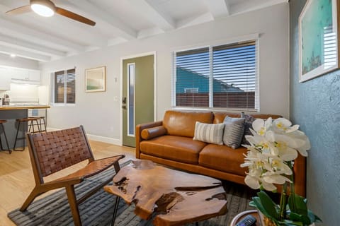 Cozy up in our spacious living room, perfect for relaxing after a day of exploring.