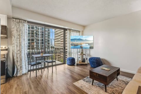 Your slice of Waikiki calm  soft cushions, warm wood tones, and a balcony that whispers “sunset wine time.” It’s the kind of space that makes you want to kick off your shoes and stay awhile.