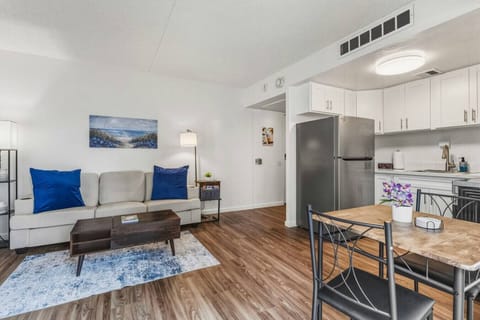 Bright, breezy, and beautifully styled, this open layout features cozy seating, fresh flowers, and a splash of coastal charm.