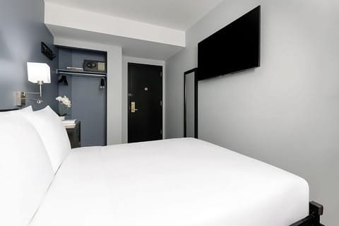 Settle in and stream favorites from bed on the large TV.