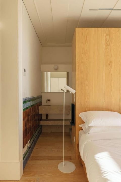 Step into a bright bedroom with thoughtful built-in details.