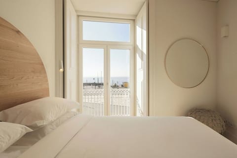 Gaze toward the horizon from bed in morning light.