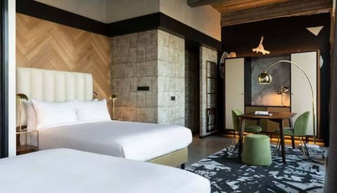 Settle in with flexible sleeping space and modern industrial style.