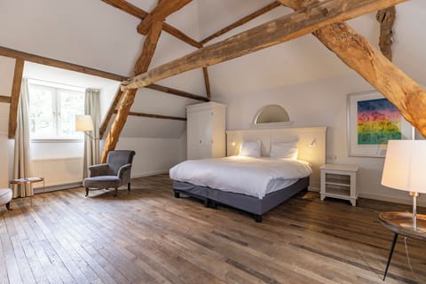 Unwind beneath rustic beams in a bright, airy loft retreat