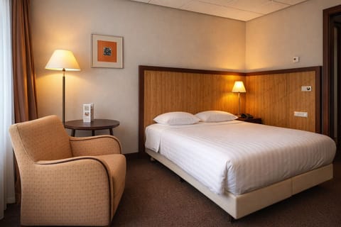 Sink into a plush double bed after a full day.