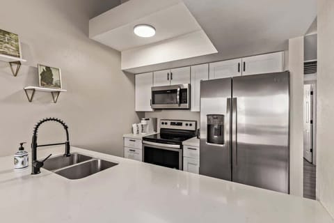 Fully stocked kitchen with modern appliances, cookware, and all essentials to prepare your favorite meals.